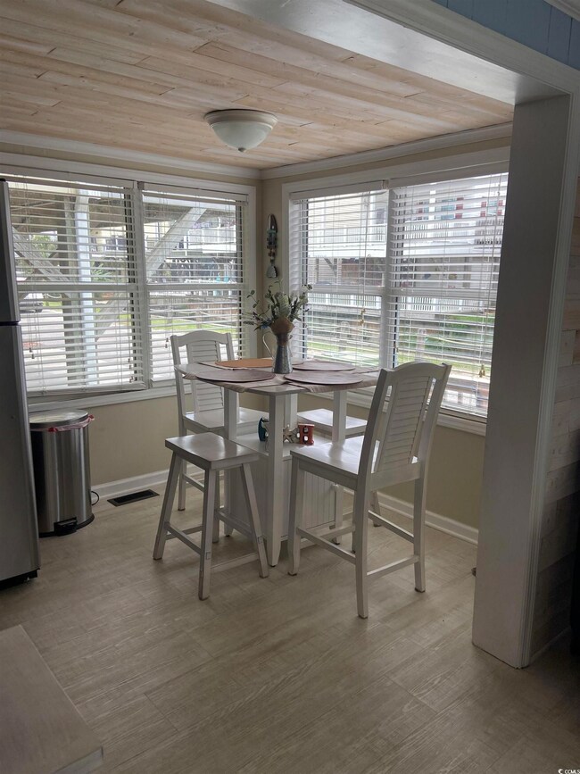 Dining room featuring wood ceiling