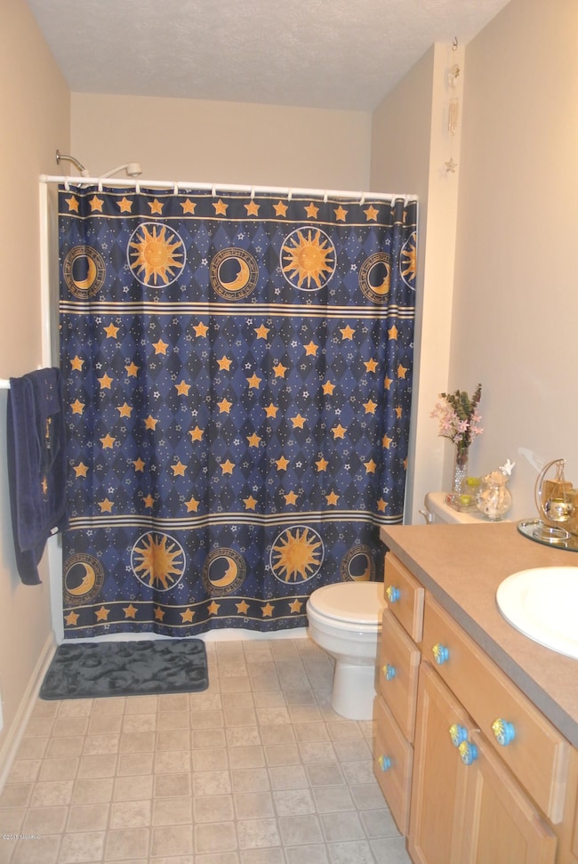 708 Stevenspoint SE unit 32, Byron Center, MI 49315 - photo 6