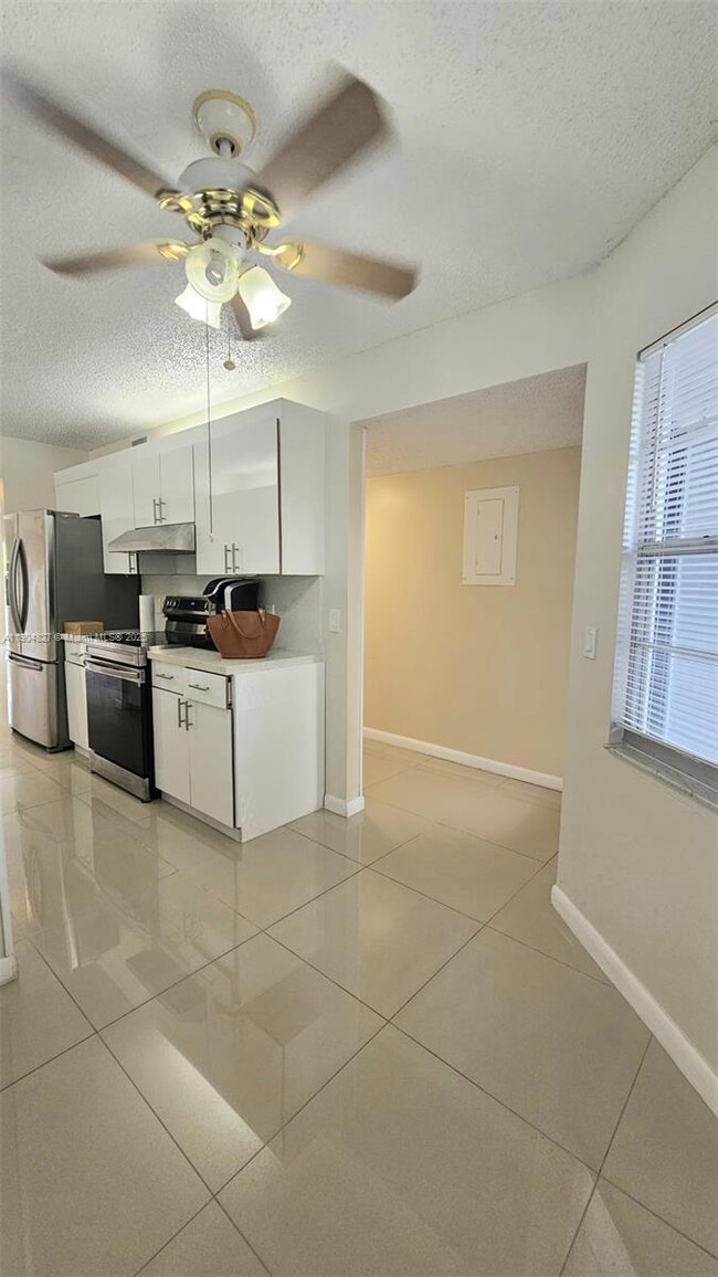 1401 SW 128th Terrace unit H410, Pembroke Pines, FL 33027 - photo 5