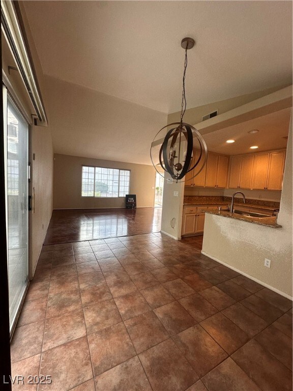 Unfurnished dining area featuring an inviting chan