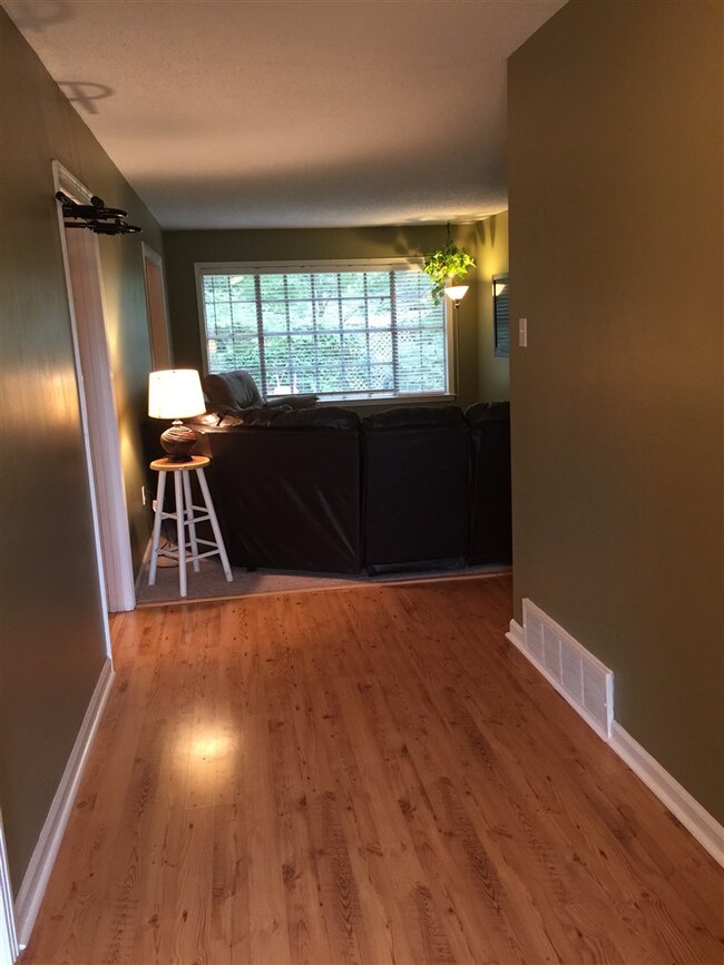 Entering front door into entryway and Greatroom