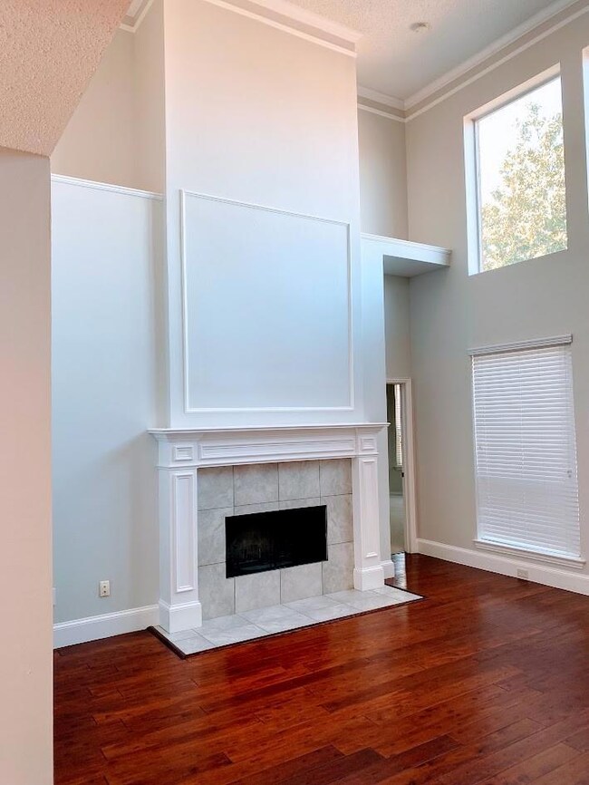Soaring gas fireplace. 1 of 3 family areas.