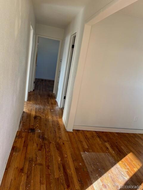 3 main floor bedrooms located down the hall from the dining room