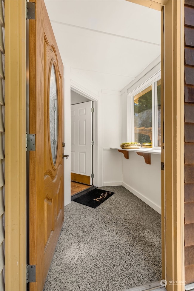 Mud room like entry to collect shoes and raise plant starts for those gardners