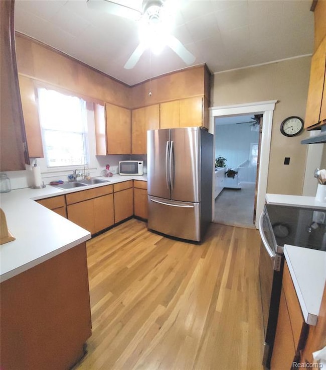 Kitchen featuring  stainless steel appliances and hardwood floors