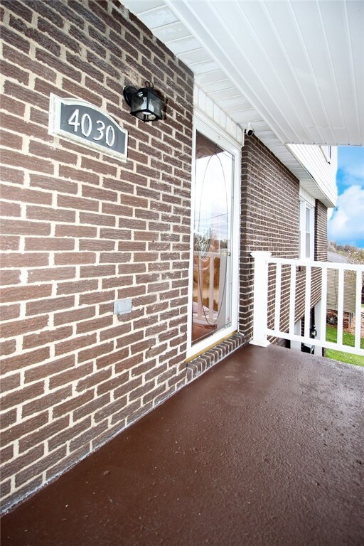 Front door and freshly painted covered concrete.