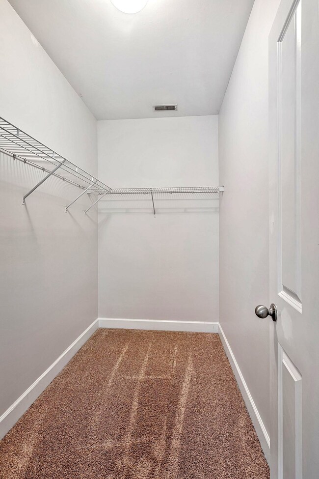 Lots of storage in the unit, including the walk-in closet off the primary bedroom.