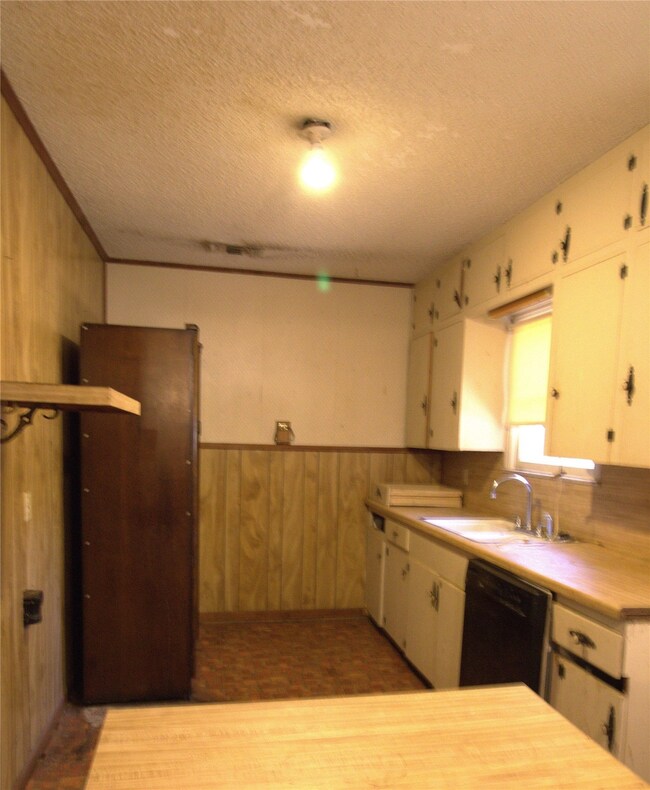 A beautiful armoire was utilized as a pantry.  Thi