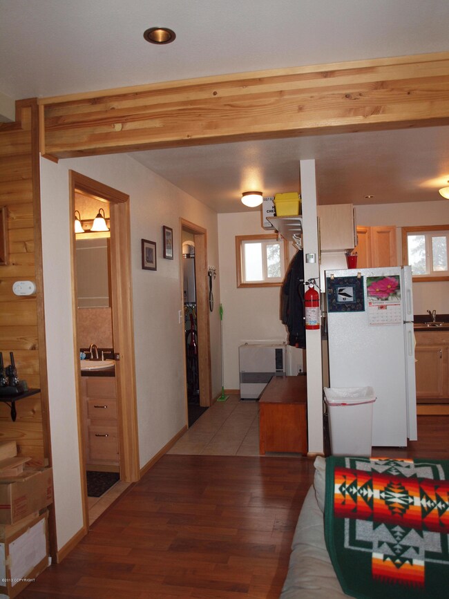entry area with bath to left