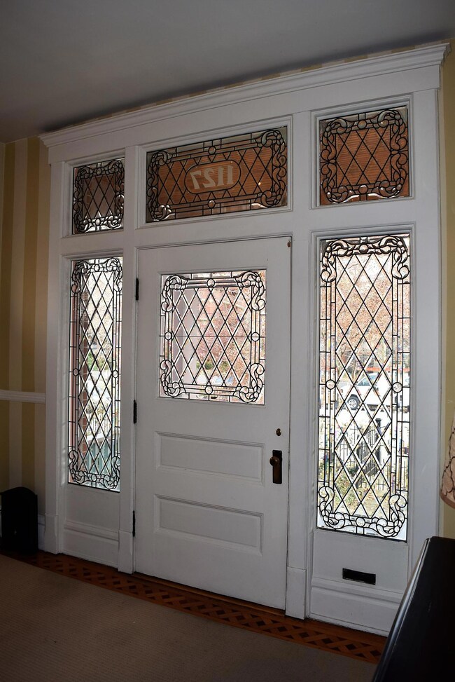 front door with side lights and transom