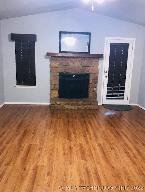 Spacious living room with fireplace.