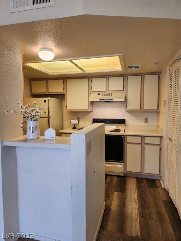 Kitchen with breakfast bar and pantry/laundry clos