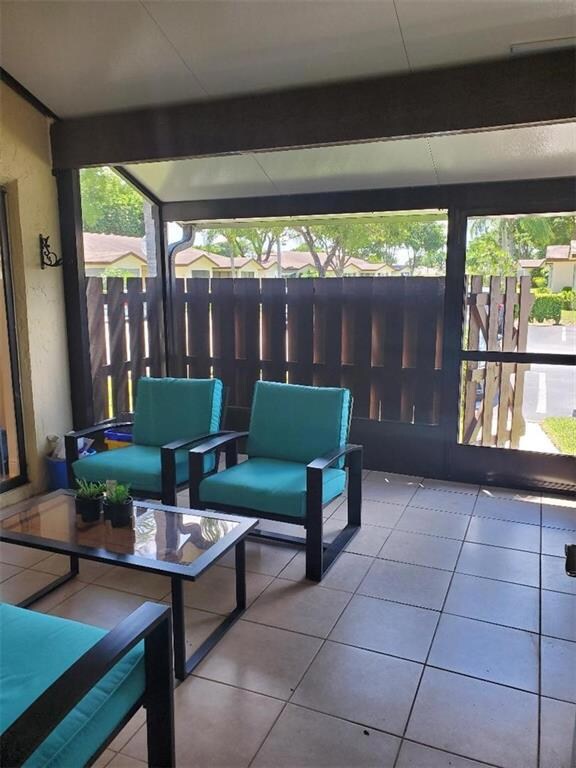 FRONT SCREENED PATIO - THIS IS ADDED LIVING SPACE!