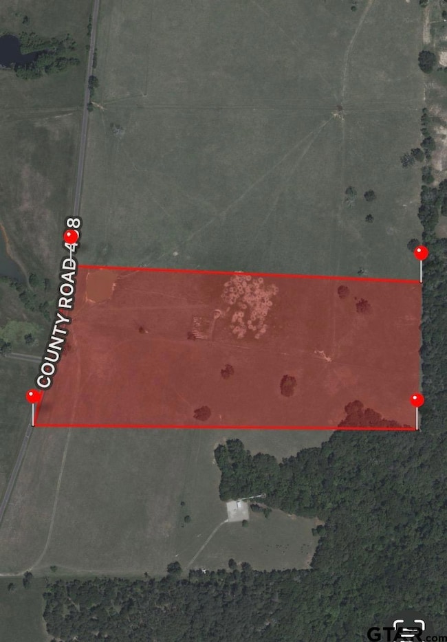 CENTER OF PROPERTY WITH POND