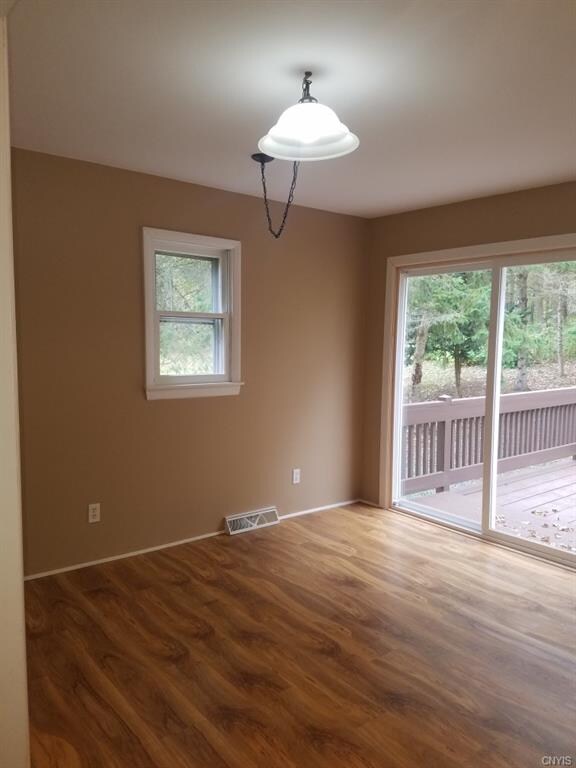 Dining space with new sliders out to back deck