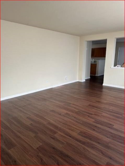 LIVING ROOM AREA FROM FRONT HALLWAY