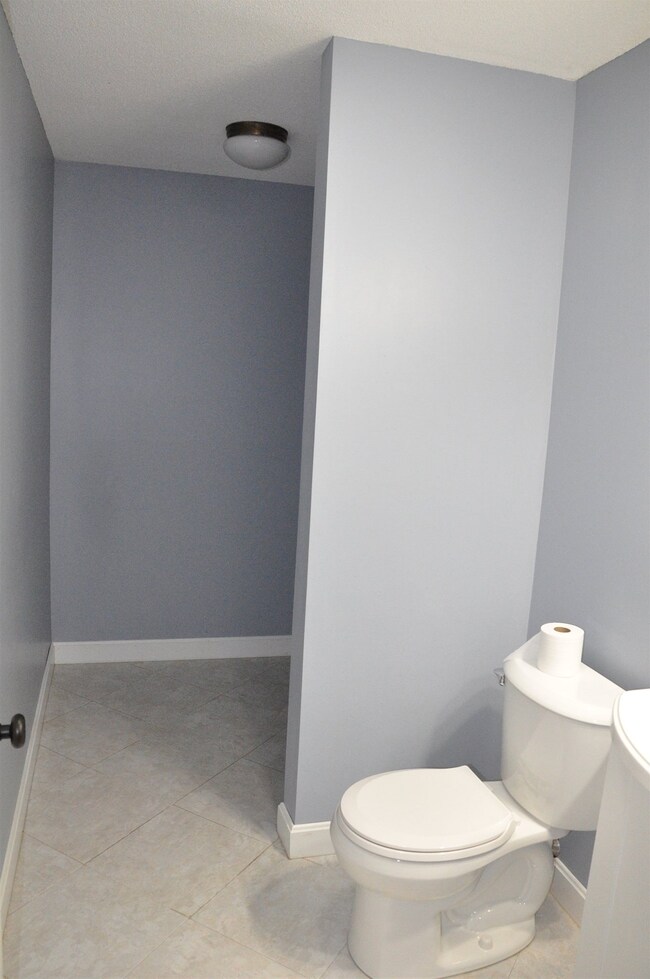 new toilets installed in both bathrooms
