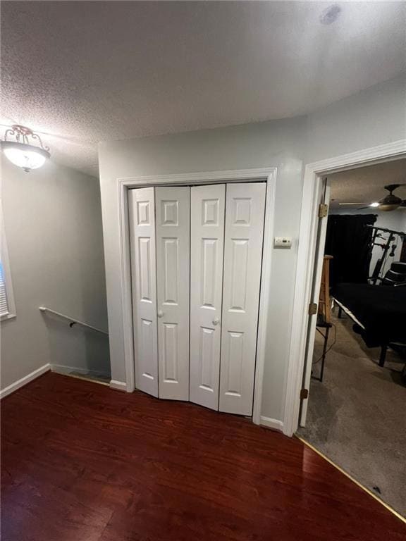 Unfurnished bedroom featuring a textured ceiling, 