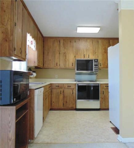 Kitchen / pantry combination with lots of cabinet space