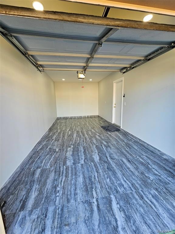 Garage featuring recessed lighting