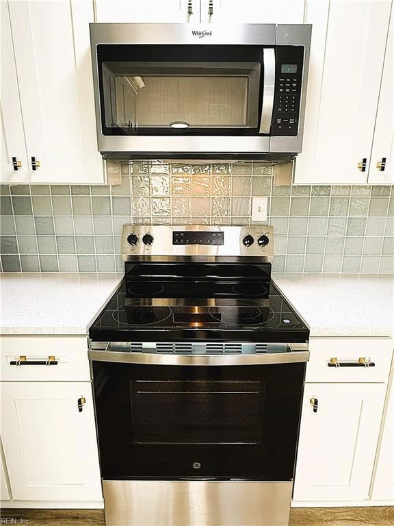 Quartz Counter Tops, High End Stainless Steel Appliances, Ceramic Tile Backsplash