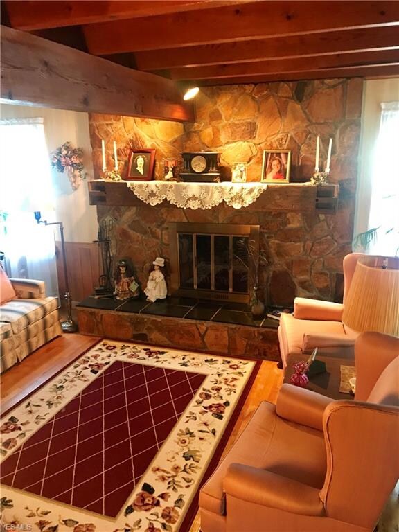Living room features beautiful wood detail, hardwo