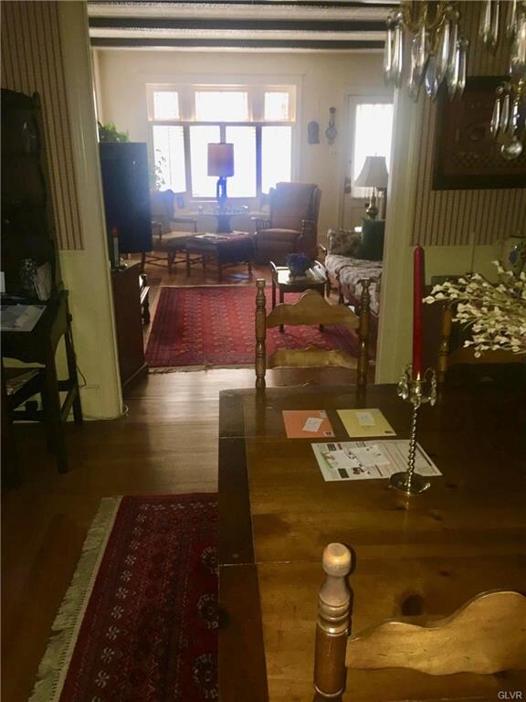 Dining room looking out towards living room and fr