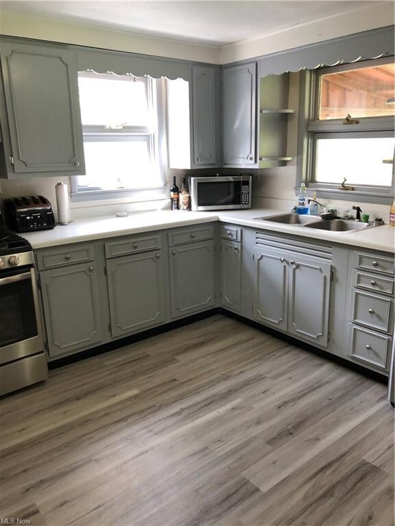 new luxury vinyl floor with painted cabinets