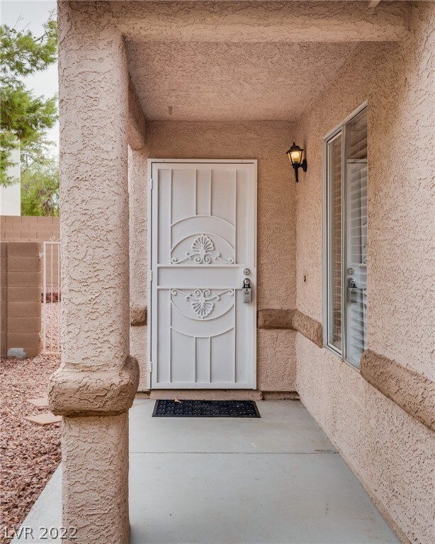 Nice covered entry all with storm door!