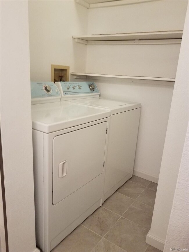 Laundry area with additional storage
