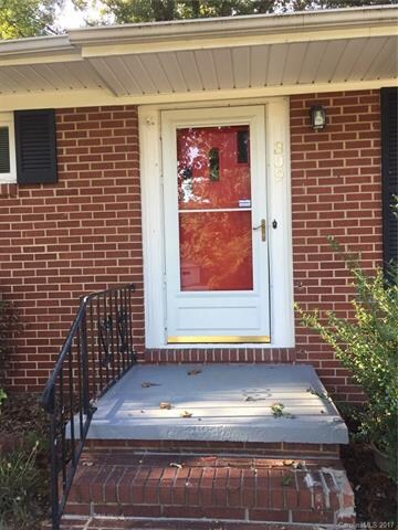 Freshly painted  porch and front door upon entry.