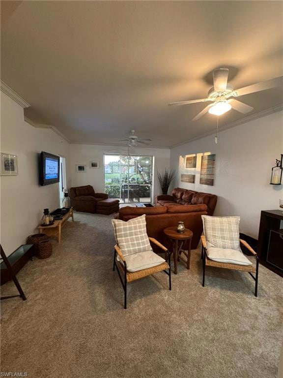 Living room featuring ceiling fan, carpet floors, 