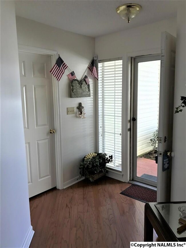 THE NICE OPEN FOYER LEADS TO THE LARGE OPEN FLOOR PLAN, LIVING ROOM, DINING ROOM & KITCHEN.  BEAUTIFUL HARDWOOD FLOORS FLOW THROUGH THESE ROOMS.
