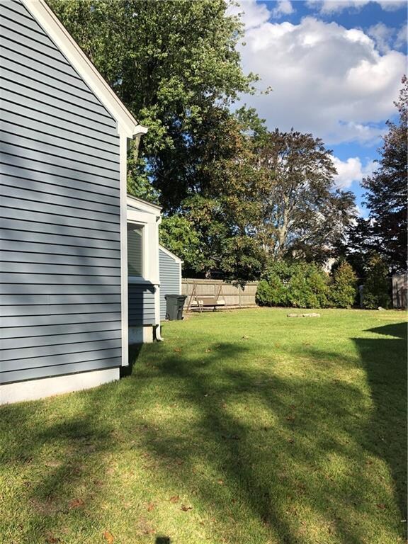 Right side view looking into rear yard
