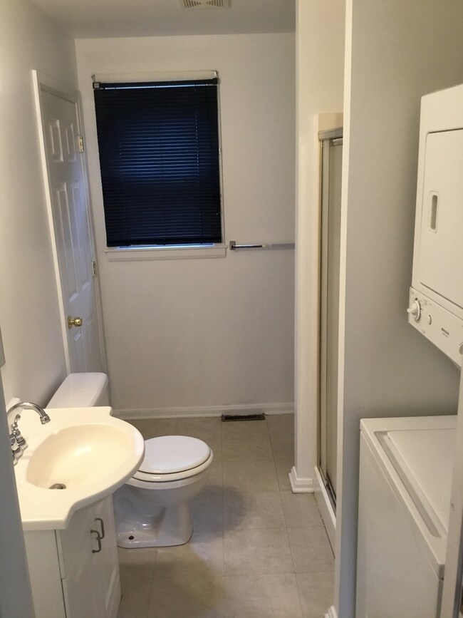 First floor full bathroom with Laundry - shared wi