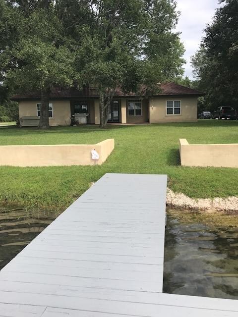 back view of home with sea wall