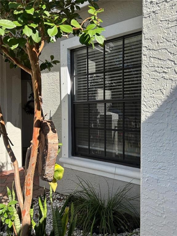 Exterior details featuring stucco siding