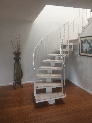 Stairway from main living area to upstairs