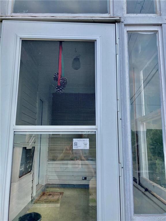 Enclosed front porch