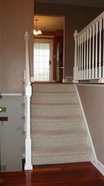 Gleaming hardwood entry