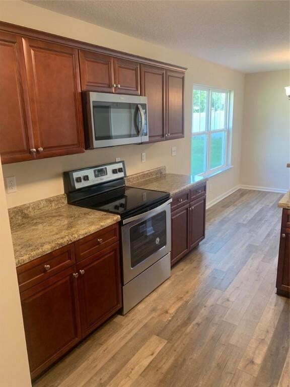 Spacious Kitchen Featuring Stainless Appliance Pac