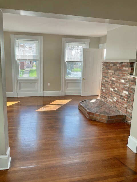 Unit 1: Double living room with hardwood floors