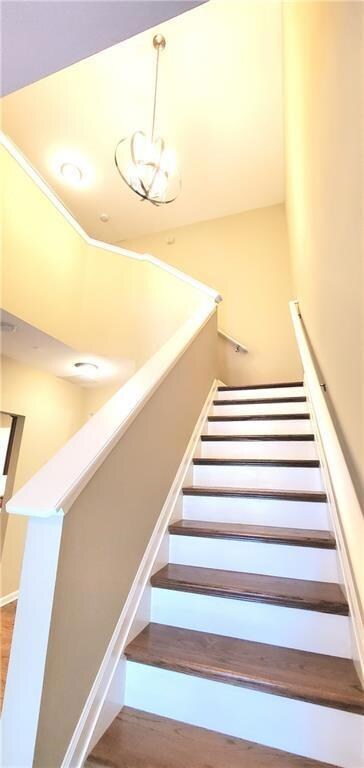 Gorgeous 2 story foyer with wood floors on stairs and new and gorgeous LVP flooring throughout main level!