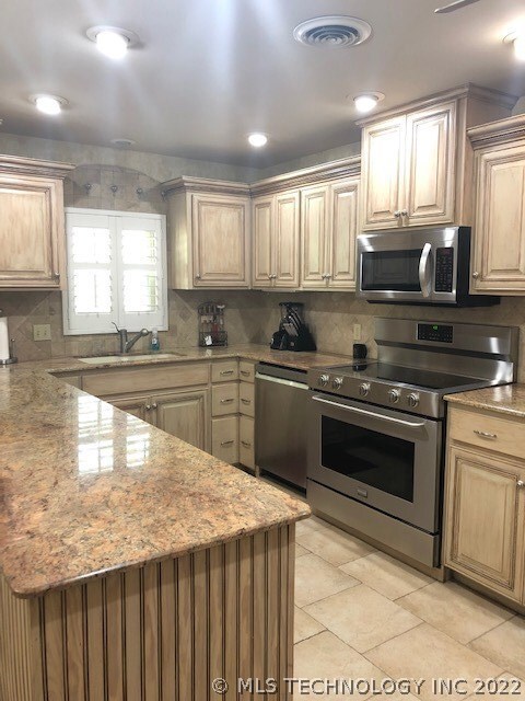 Large kitchen with granite and plenty of storage!