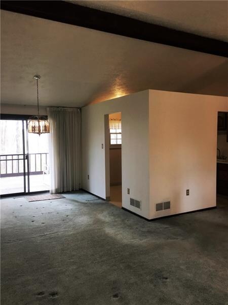 Dinning room open onto great deck overlooking a wo