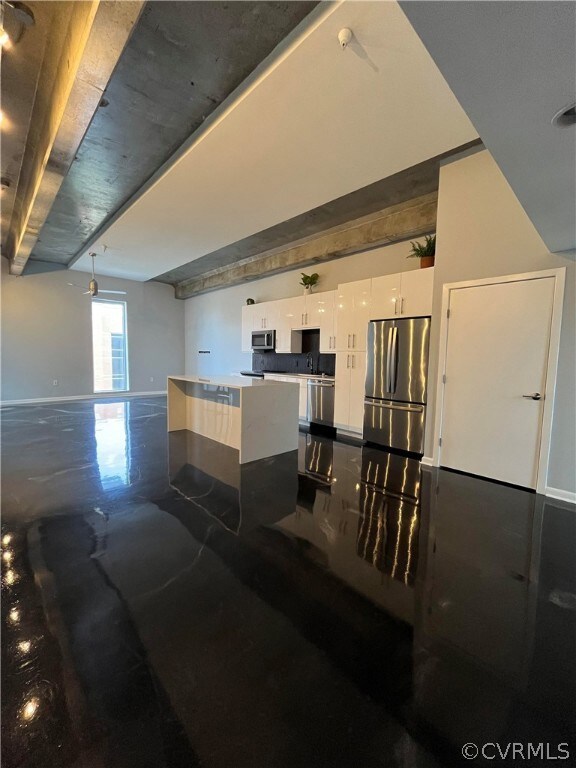 Open concept with gorgeous epoxy floors