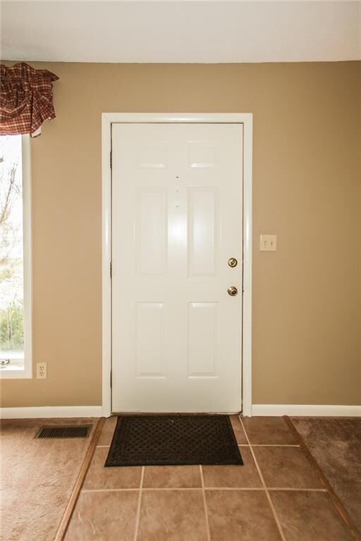 Entry on tile --not the carpet.