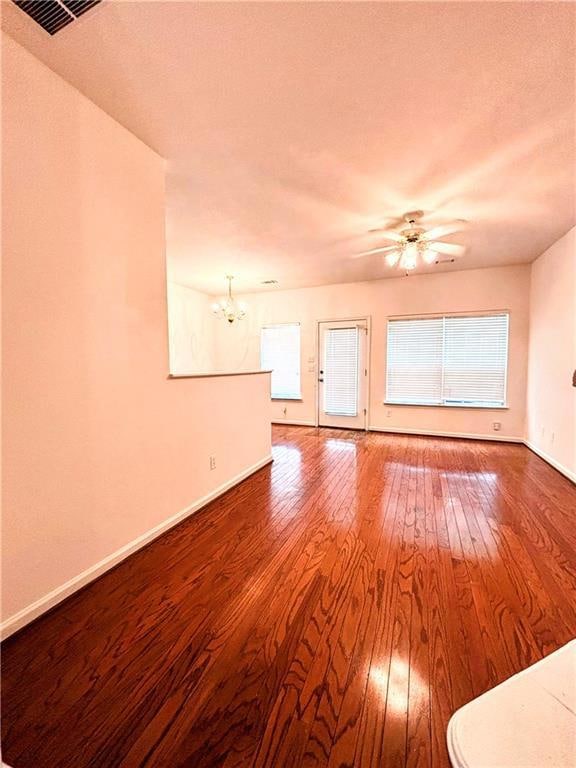 Unfurnished living room featuring a textured ceili