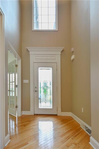 Two-story entry.  Office/den is through the french