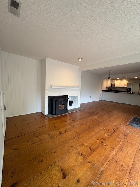 The Country Charm of Wide Board Floors and a Pellet Stove to keep you toasty warm